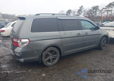2007 Honda Odyssey Ex-L z USA, uszkodzony, nr VIN 5FNRL38657B451980
